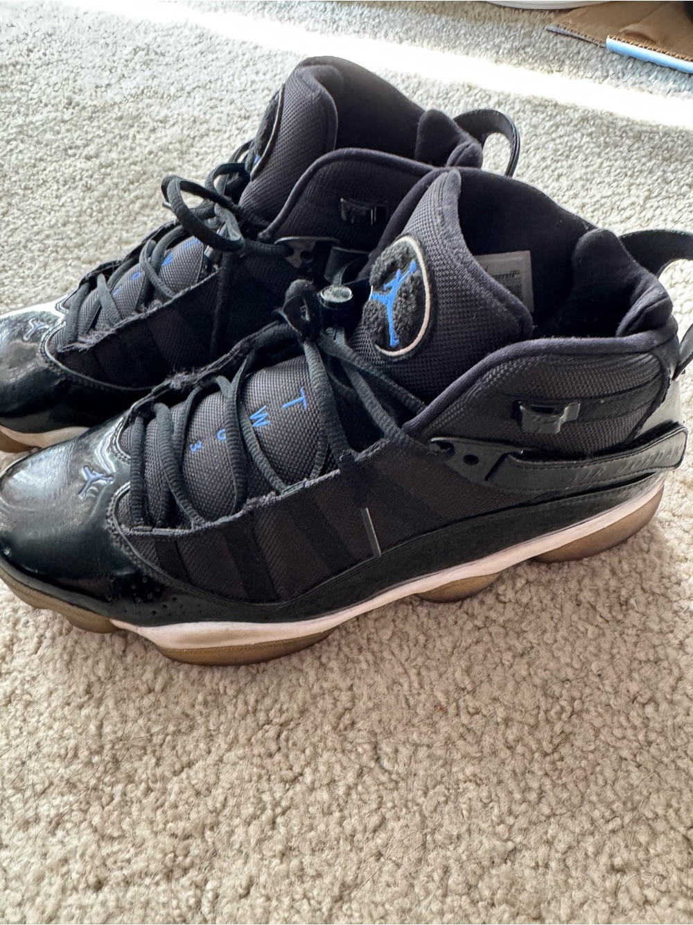 Jordan’s Men's Black Sneakers with Blue Logo